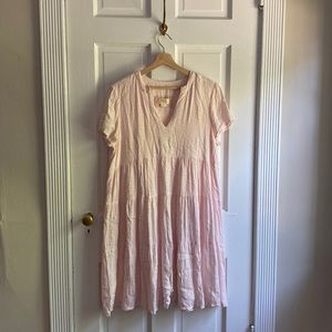 Maeve Anthropologie tiered tunic dress in light pink.